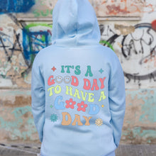 Lade das Bild in den Galerie-Viewer, Džemperis su gobtuvu ir tekstu nugaroje &quot;It&#39;s a Good Day to Have a Good Day&quot;, S-3XL
